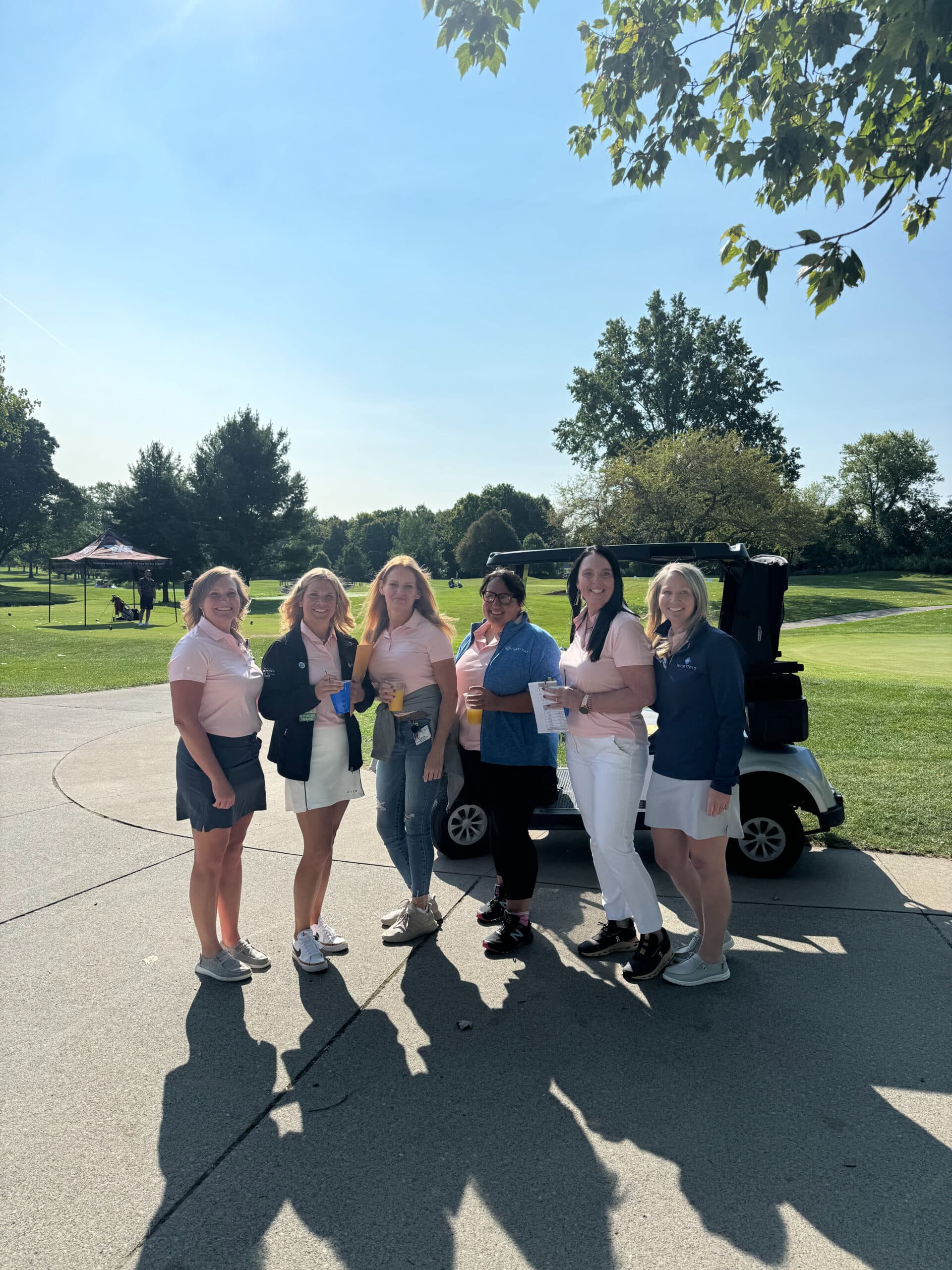 Staff participating at golf outing