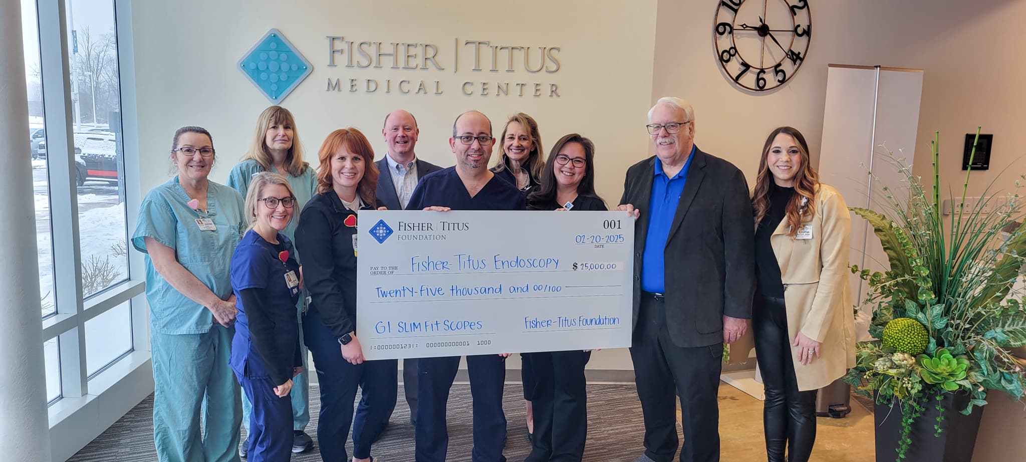 Staff receiving big check donation