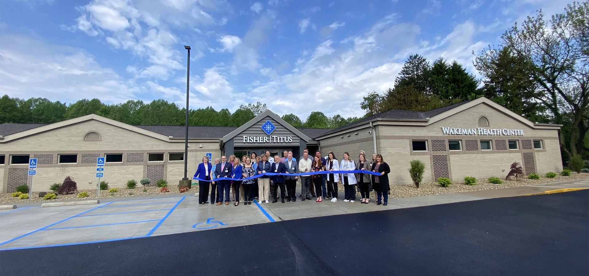Ribbon cutting ceremony at Fisher-Titus Wakeman Health Center exterior