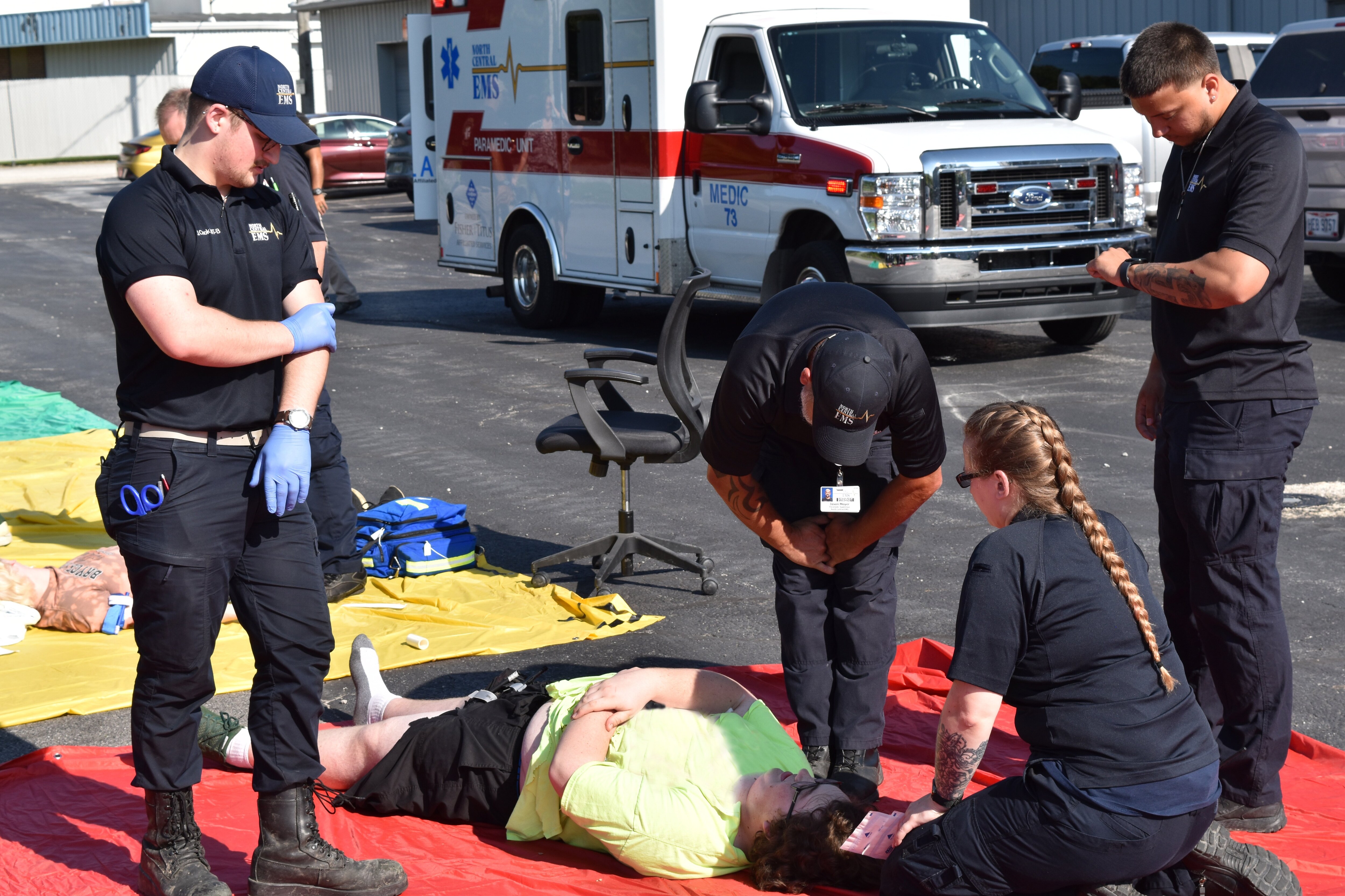 North Central EMS Team Members provide care for a role-player acting as a patient.