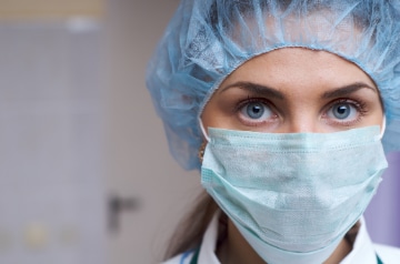 Nurse in face mask.